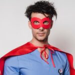 Male nurse in superhero halloween costume.