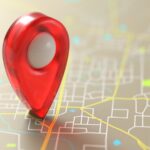 Red pin placed on a map of streets.