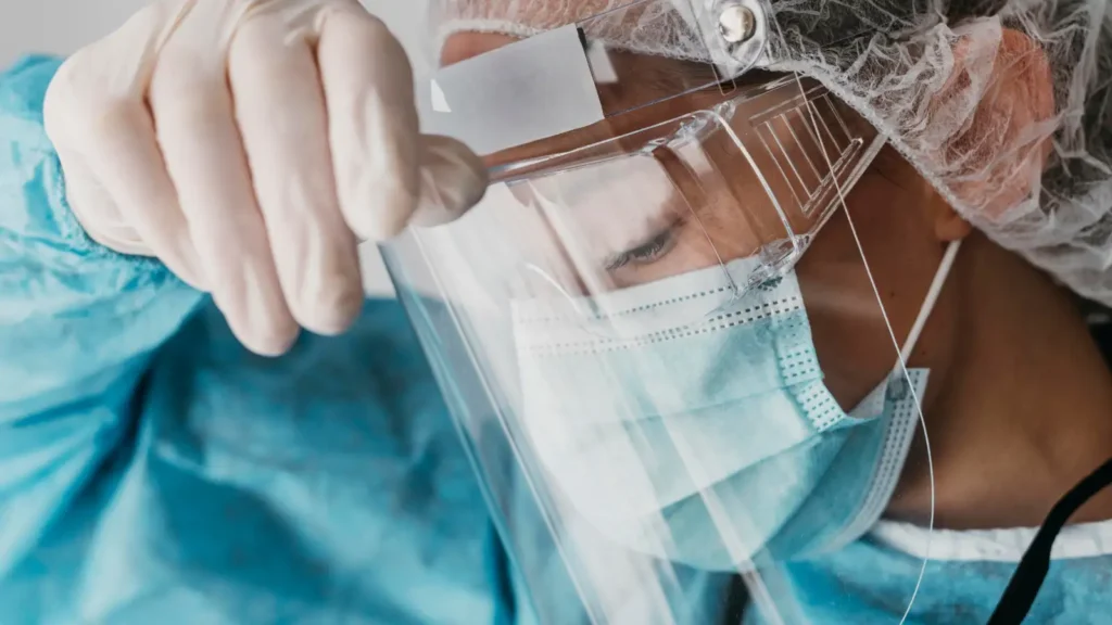 Close up of a nurse with a surgical mask